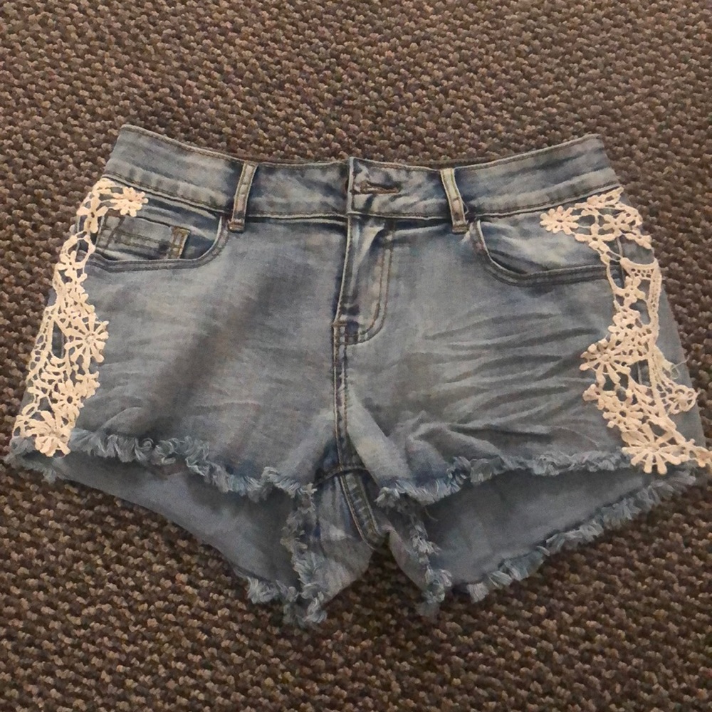 Denim shorts with lace embroidery